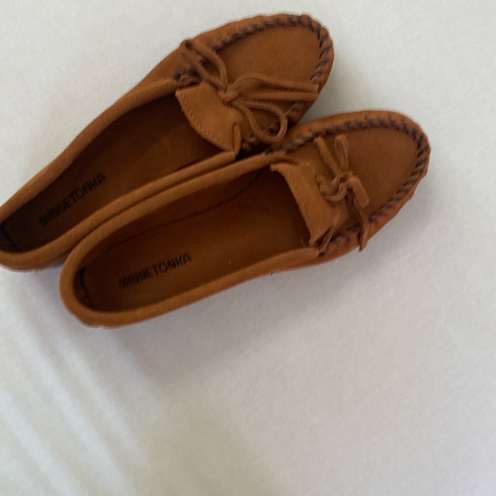 Minnetonka classic moccasin. Never been worn.